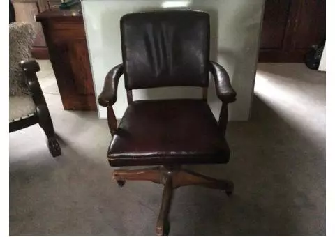 Old leather swivel office chair.