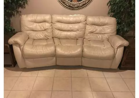Leather Sofa with 2 reclining seats.